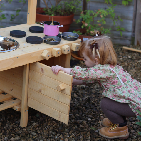 mud kitchen benefits for toddlers