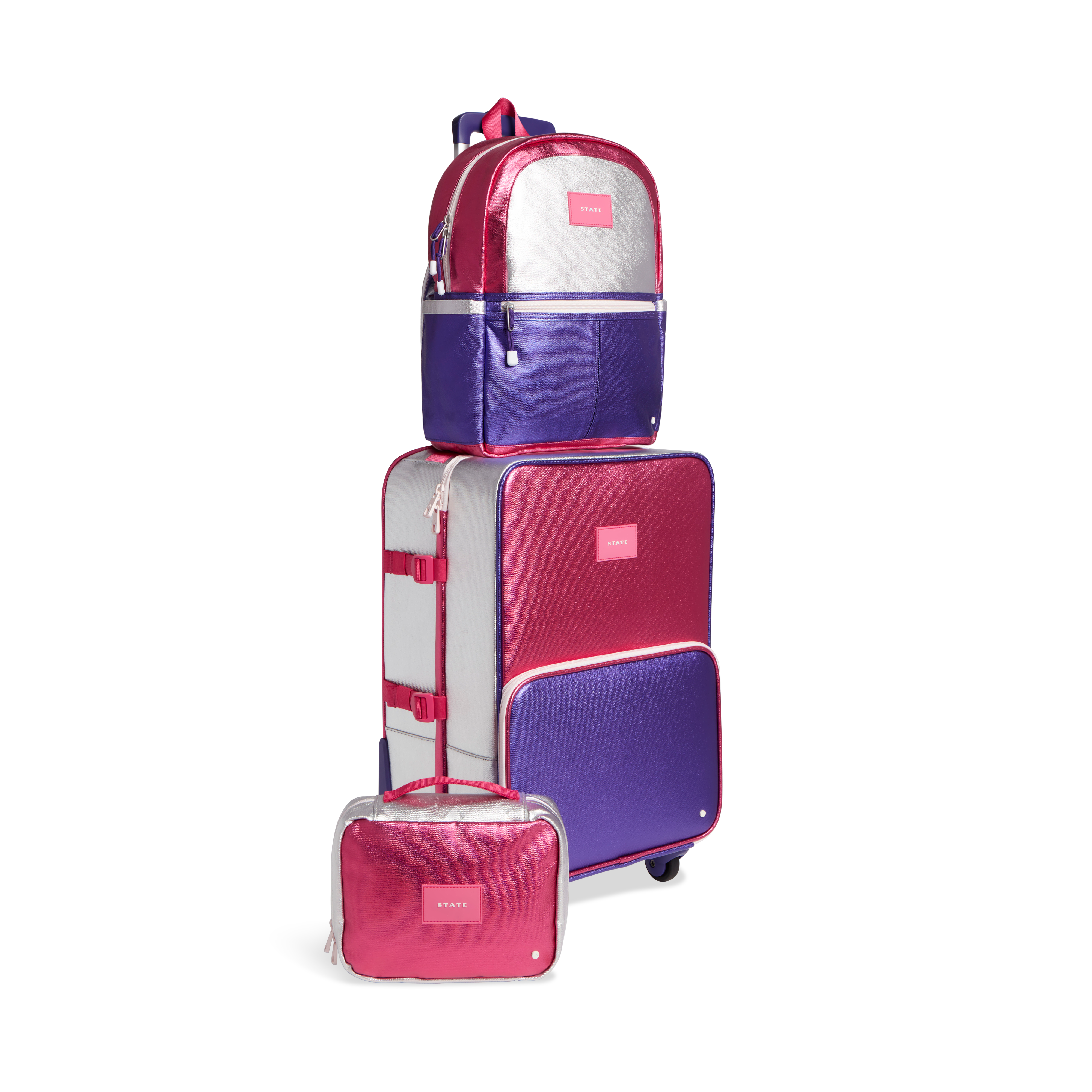Product image of STATE Bags travel set in metallic hot pink/purple including, Logan suitcase, bensen toiletry bag, and Kane Kids Travel backpack 