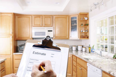 A person writing on a clipboard. 