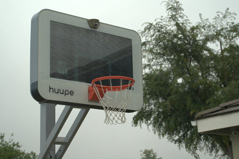 Close-up of huupe in a driveway.