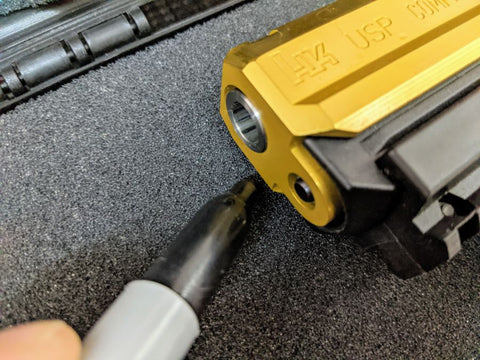 Arranged pistol on a foam insert for tracing