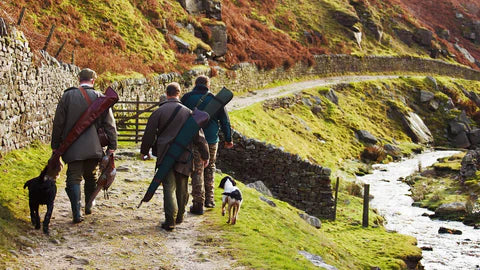 A pack of hunters on a hunting trip