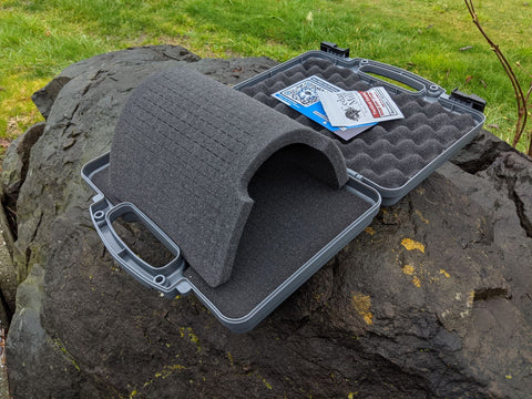 A pistol case with a pick and pluck foam insert with an egg-tray soft cushioning.