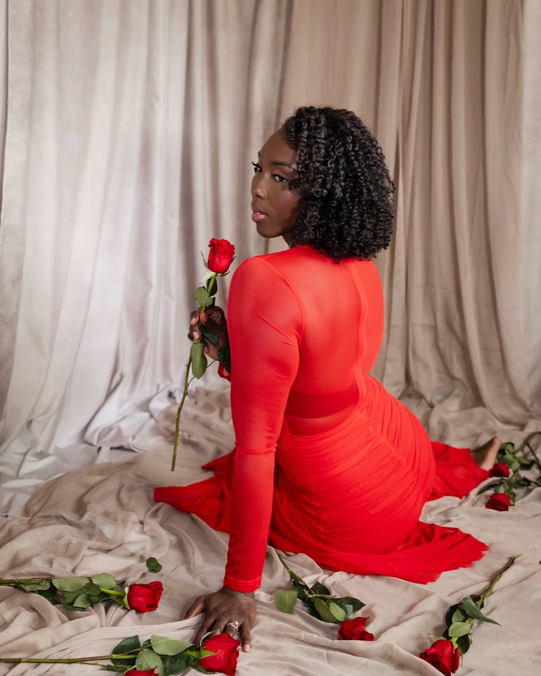Dayna Bolden hairstyling transformation from switch from a chic, short tapered cut to a head-turning, voluminous curly look with the True + Pure Texture Layla Curl Lace Closure Wig is a story of self-love liberation