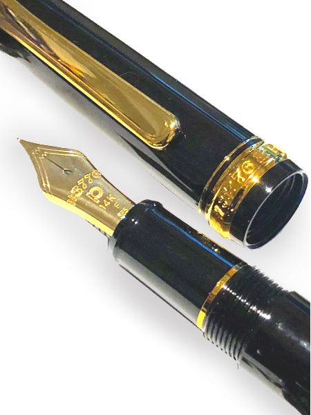 https://cdn.shopify.com/s/files/1/0598/4862/2236/products/platinum-3776-century-fountain-pen-black-gold-nib_1_1_450x600.jpg?v=1688465420