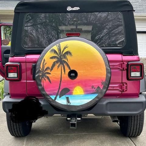 Beach scene with sunset colors spare tire cover on a Tuscadero pink Jeep wrangler