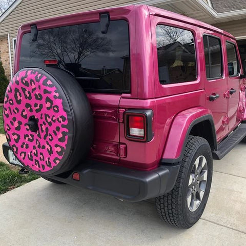 Tuscadero Pink Jeep Wrangler with a pink leopard print spare tire cover for Jeep