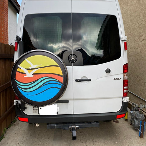 Beach Spare Tire Cover on a Sprinter Van, Waves and the Sun with Birds Flying Spare Tire Cover Design