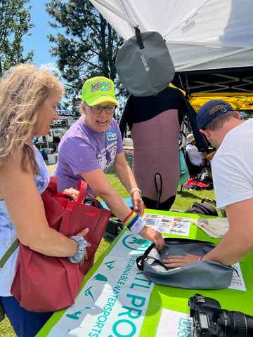 Discussing Turtl Project's wetsuits at our booth