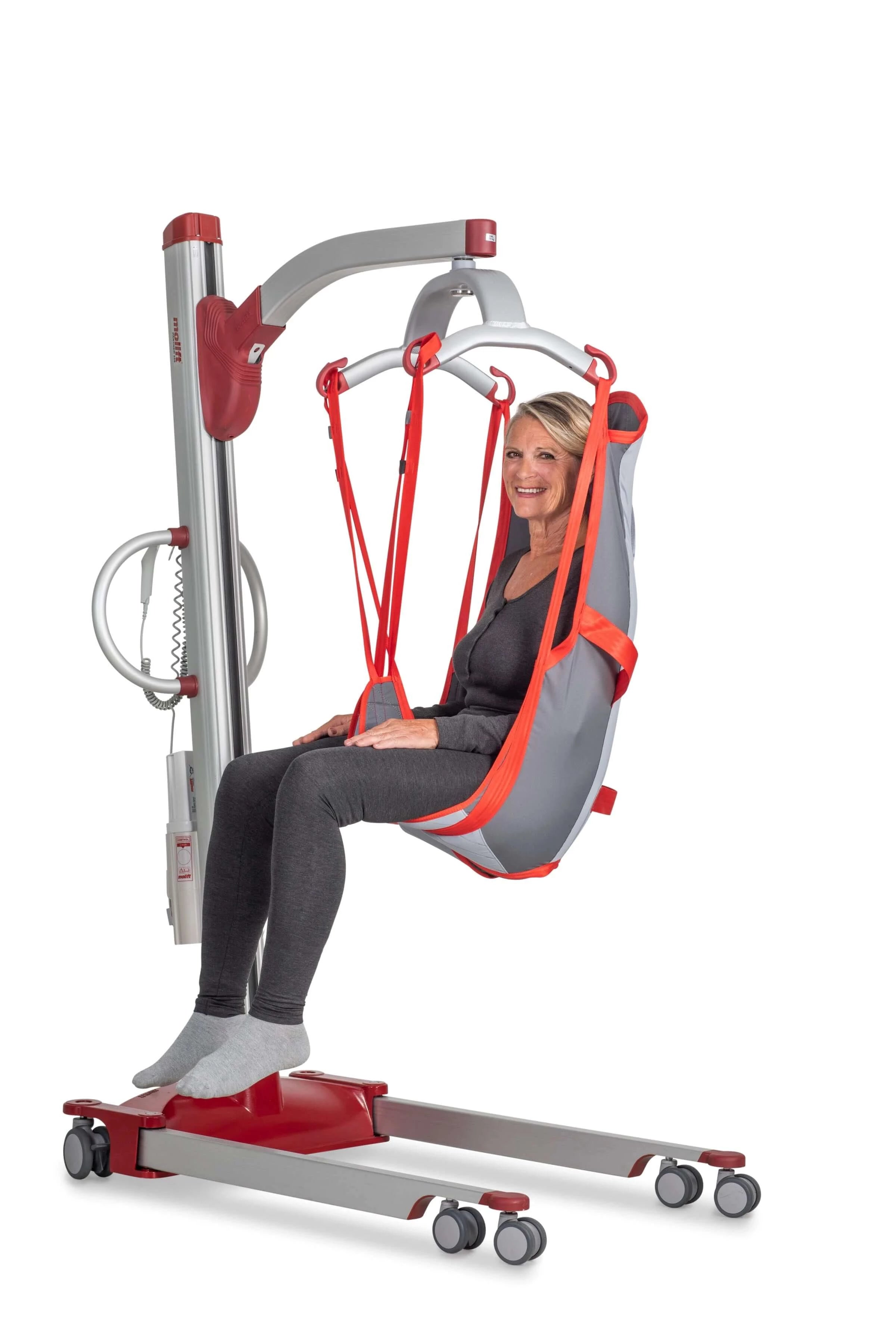 molift partner 255 patient lift used by a lady looking at the camera