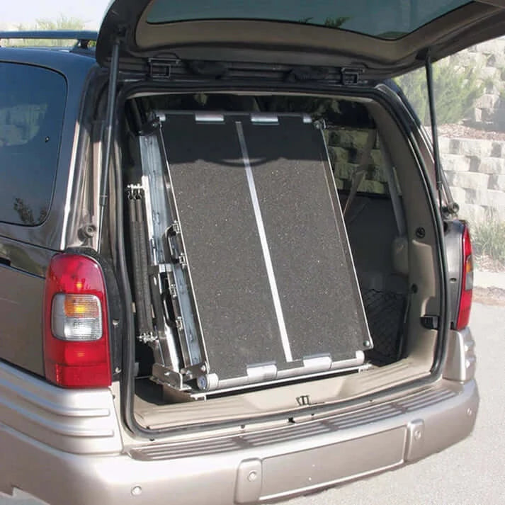 Multi-Fold Rear Door Mountable Van Wheelchair Ramp folded up into a minivan