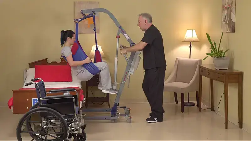 bestcare bestlift pl500 used by a patient being lifted with the help of her nurse
