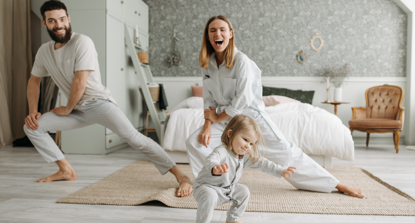 a family dances and laughs