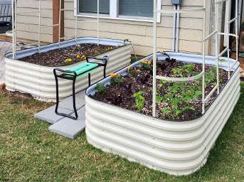 galvanized raised garden bed growing plants with garden trellis installed on it-Vegega