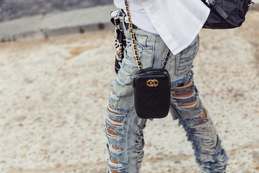Distressed jeans and chanel scarf used as belt and chanel quilted handbag