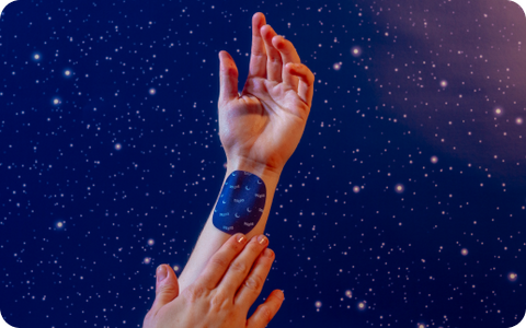 A DEEPS Sleep Patch is applied to a wrist in preparation for going to sleep