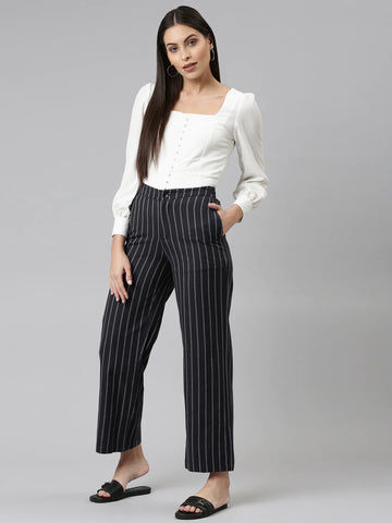 Image of a Model wearing Go Colors Cotton Wide pants.