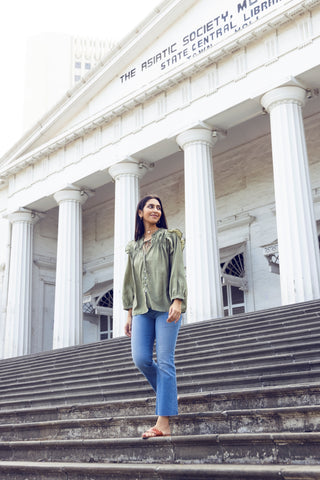 Image of a Model wearing Go Colors Mini Flare Jeans.