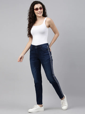 Image of woman wearing straight leg jeans by Go Colors