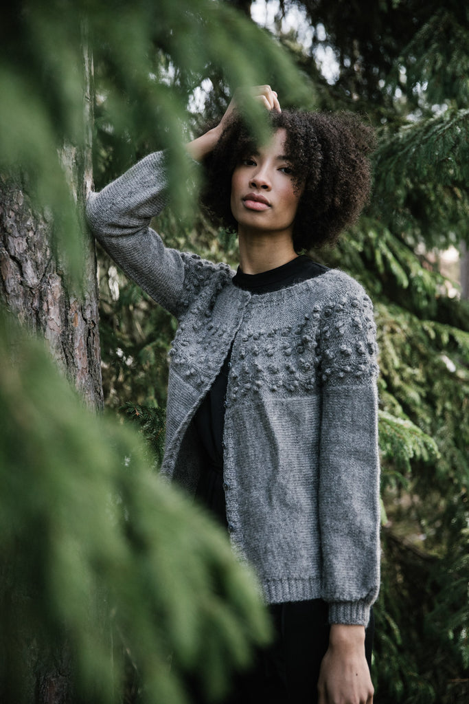 A picture of the Lakka cardigan, worn by a model.