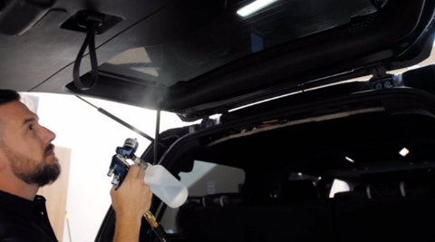 Spraying car interior with Titania