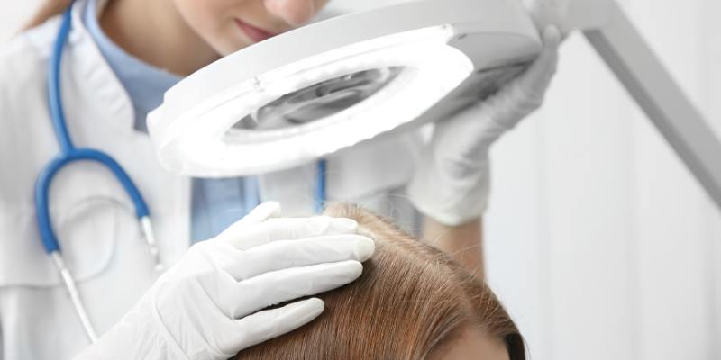 dermatologist examining hair