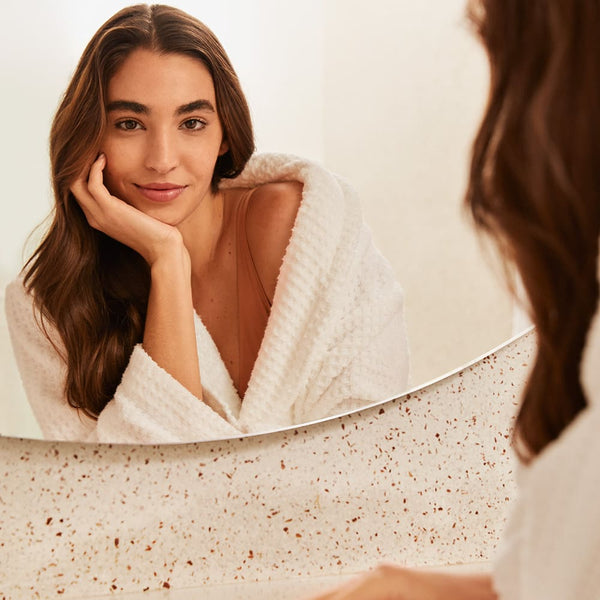 Girl staring at the mirror