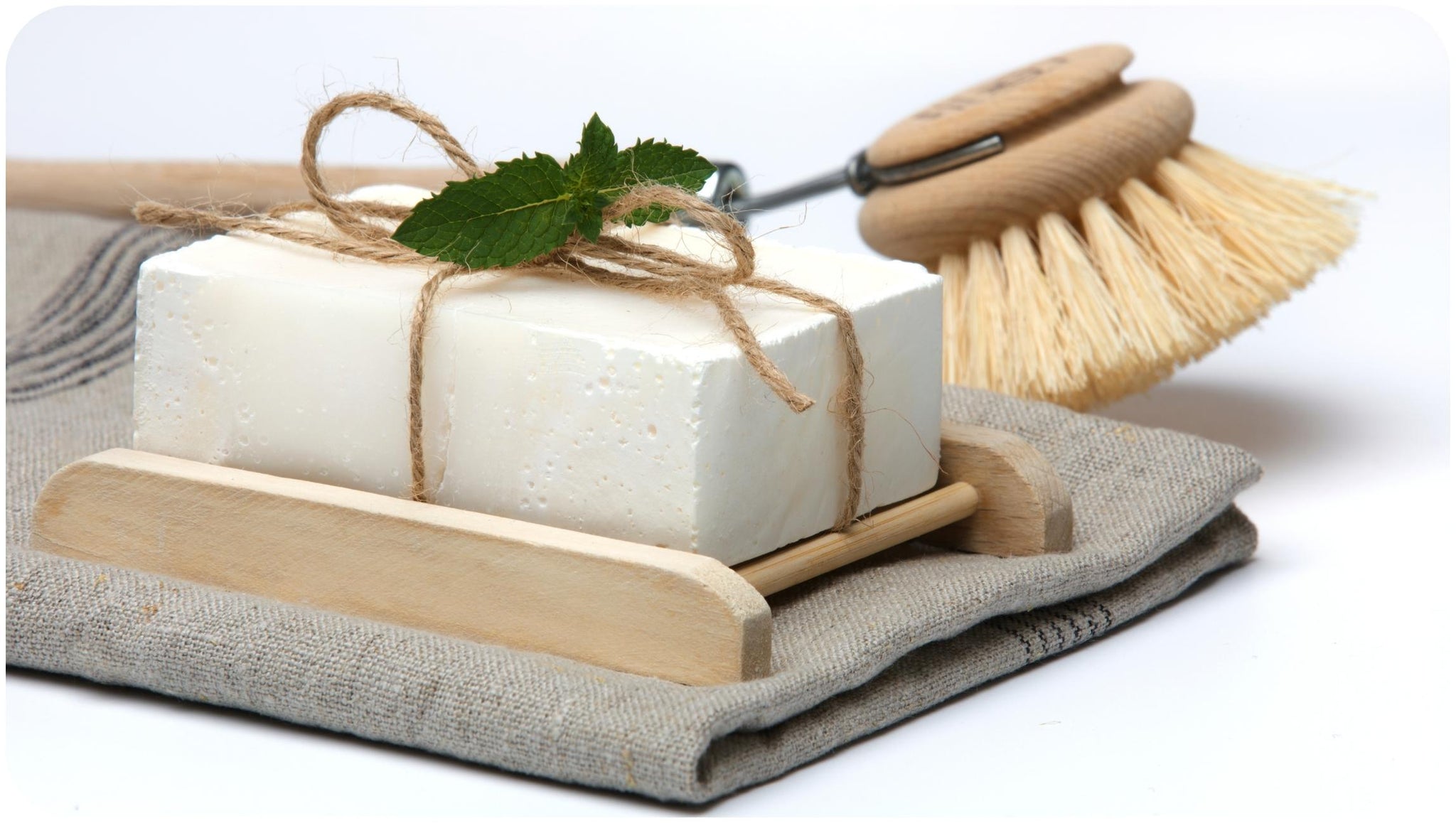 Eco-friendly dish soap bar with wooden brush