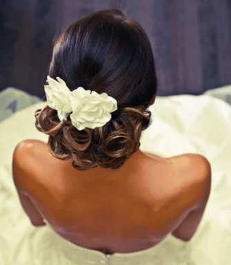 Low Updo with Flowers, Ringlets, and Veil