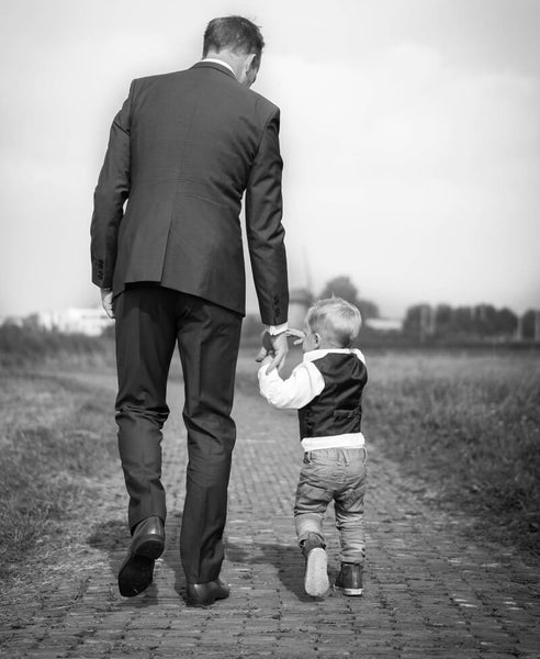 Toddler boy walk with Dad