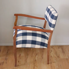 After Photo: Little timber armchair upholstered in navy blue gingham after having a complete timber & upholstery restoration completed by Luxe & Humble Toowoomba (side view)