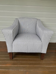 Reupholstered armchair in navy blue ticking fabric. Reupholstered by Luxe & Humble - Toowoomba Upholsterers