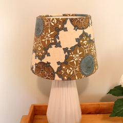 Custom empire lampshade manufactured by Luxe & Humble in a Nine Muses by Tigger Hall fabric.