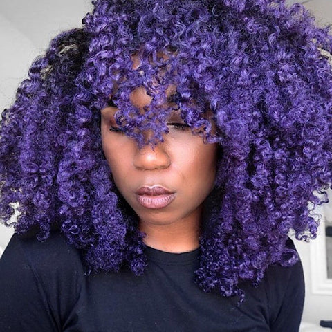 Vlogger Whitney White @Naptural85 with purple hair