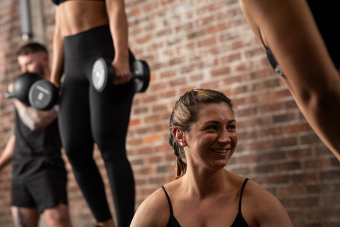 Woman smiling after training