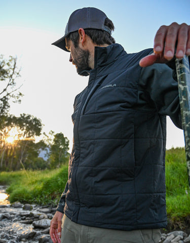 Stopping on the banks of the Yellowstone River in the Fusion Hybrid Jacket from Skwala Fishing.