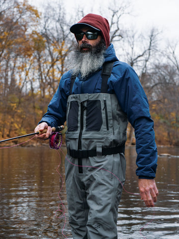 Wading through a midwestern stream in the fall in search of the ferocious smallmouth bass. 