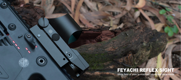 Tactical reflex sight mounted on a firearm with highlighted features for wide field view and situational awareness in outdoor environments.