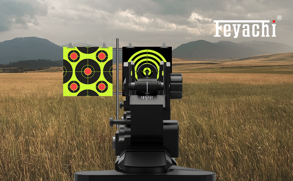 Red dot sight aiming at a target practice board in an open field, demonstrating sighting accuracy and clarity.