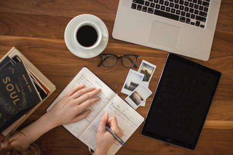 girl writing in notbook