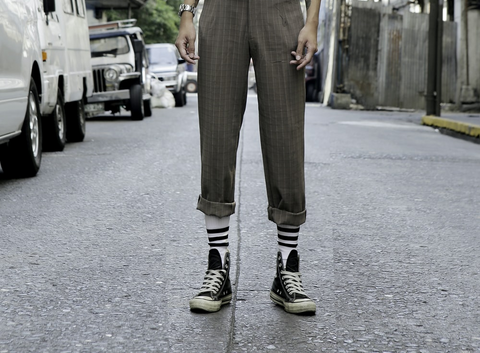 A man wearing sneaker match socks
