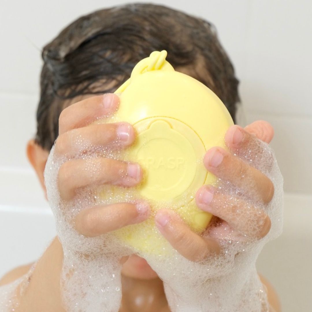 pebbl bathtime cleansing brush sponge for washing kids and kids and baby bath time