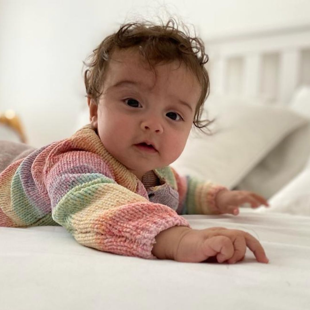 Tummy time is time on your baby's front when they are not sleeping