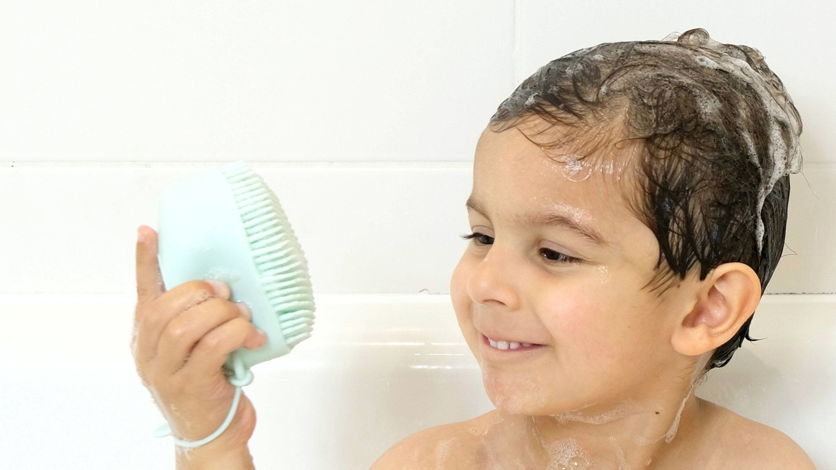 pebbl bath time scrubbing and washing brush for kids