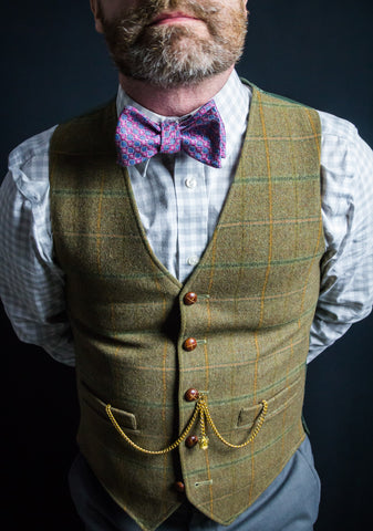 Brown Vest with Red Bow Tie