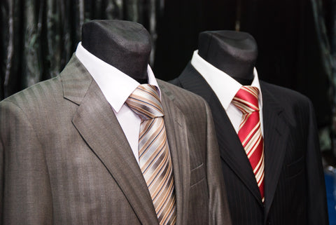 Mannequins Wearing Suits and Striped Ties