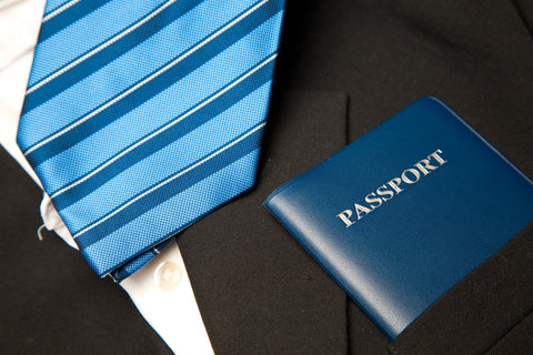 Blue Necktie on Suit and Passport