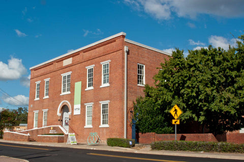 the front of the Wiregrass Museum of Art brick building in Dothan Alabama