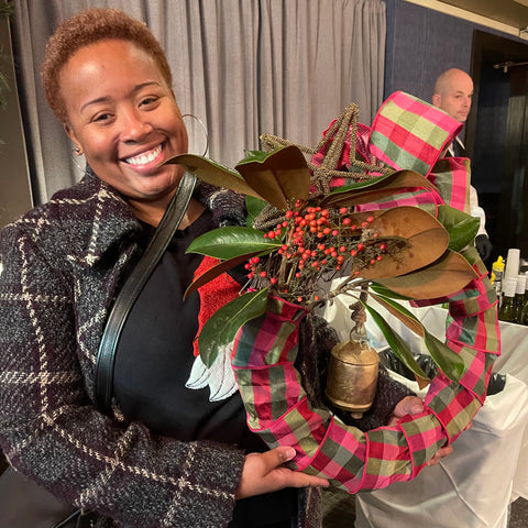 corporate wreath workshop atlanta at rays on the river happy black woman