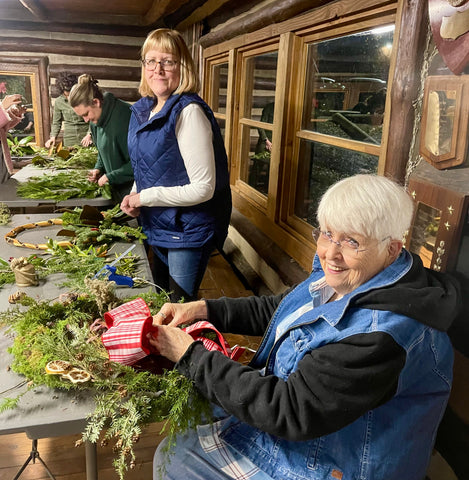 mother and daughter crafting wreaths at a workshop in atlanta georgia in Alpharetta